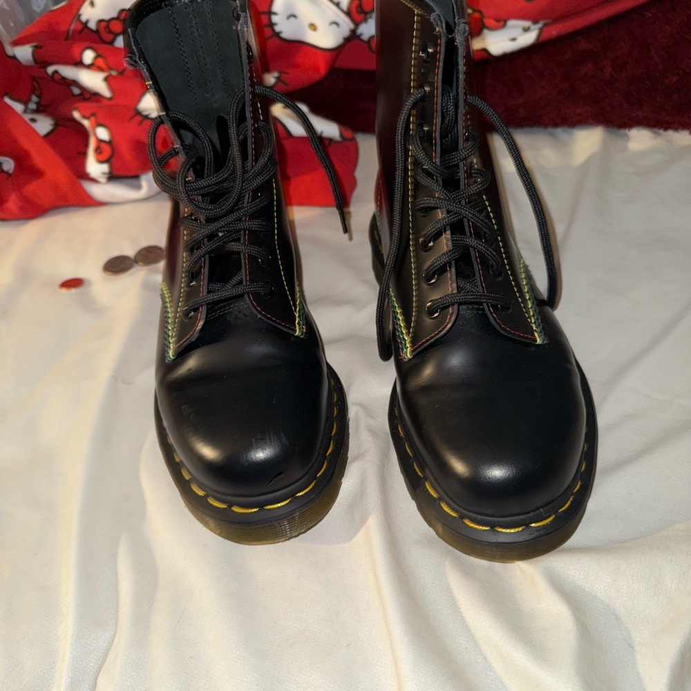 I’m selling a pair of Dr.Martens. Featuring the Pride flag on the side!